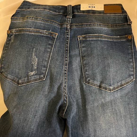 Judy blue distressed Buffalo plaid jeans. New with tags. Size 0/24(size4). - Picture 5 of 7